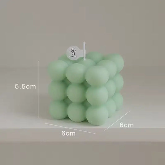 Bubble Cube Candle green variant size GiftDealAU product image. Green bubble candle with dimensions on a neutral background