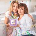 3D Pop Up Butterfly Birthday Box GiftDealAU women holding box Product Image. Two women holding a decorative box with butterflies against a blurred indoor background.