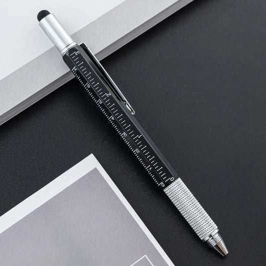6-in-1 Multi-Tool Stylus Pen Multifunctional pen with ruler on a black surface