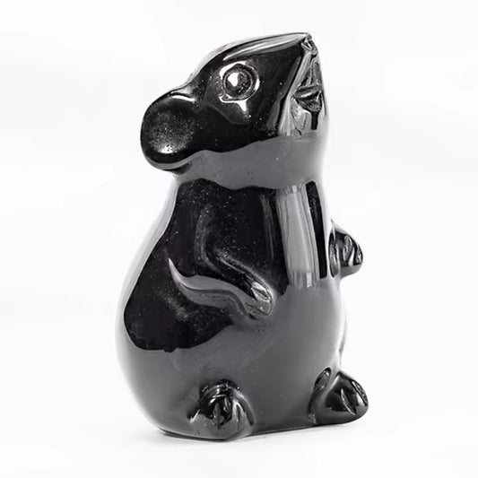 Black Obsidian Mouse A glossy black polished stone figurine of a small rodent, likely a beaver or nutria, standing upright on a white background.