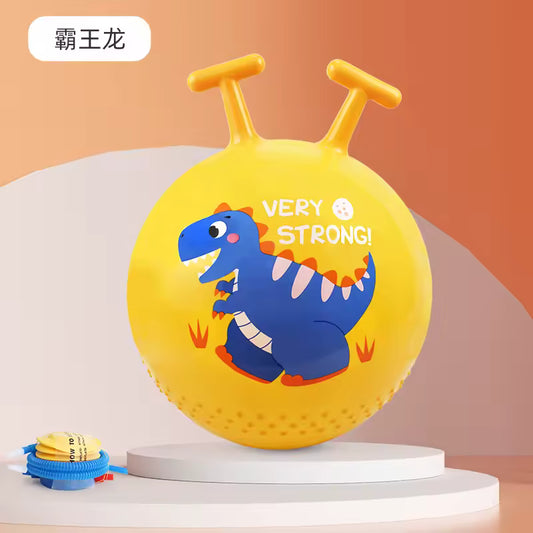Bouncing Hopper Ball with Handle Yellow inflatable bounce ball toy with two handles, featuring a blue dinosaur graphic and the words 'VERY STRONG!' on the front, displayed on a white pedestal with a deflated blue and yellow version at the bottom left.