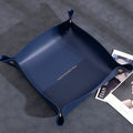 Suede Valet Tray Leather Catchall Tray Blue leather tray with gold accents on a gray surface