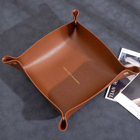 Suede Valet Tray Leather Catchall Tray Brown leather tray on a dark surface with text