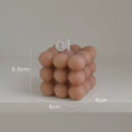 Bubble Cube Candle brown variant size GiftDealAU product image. Cylindrical candle with bubble design and measurements on a neutral background