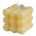 Bubble Cube Candle yellow variant
GiftDealAU product image.Yellow bubble candle with a brand label on a white background.