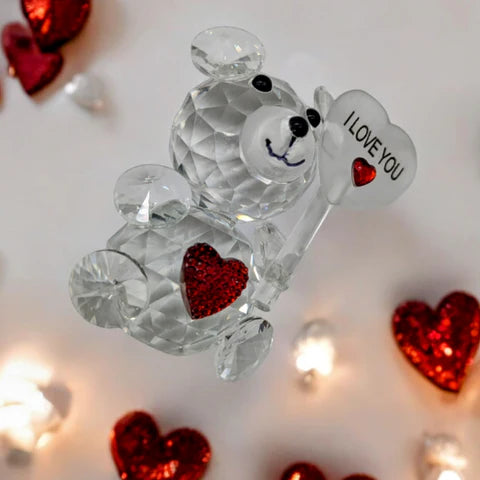 Crystal Clear Glass Bear Statue Crystal bear figurine with 'I LOVE YOU' on a heart, surrounded by red hearts and lights.