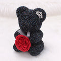 Crystal Diamond Bear Black glitter teddy bear with a red rose on a white background