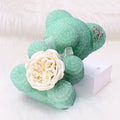 Crystal Diamond Bear Green glittery teddy bow with a white rose on a white background