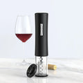 Magic Wine Aerator - Red Wine Decanter for Better Taste Black electric wine opener with a glass of red wine on a white background