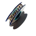 Evil Eye Hair Claw Clip centre side GiftDealAU product image. Ring with blue and silver design on a white background