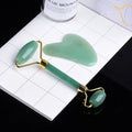 Facial Roller and Gua Sha Gift Set Blue jade roller and gua sha tool on a white surface with a black background