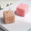 Honeycomb Cube Candle
pink and yellow variant GiftDealAU product image. Two honeycomb-patterned candles on a white surface