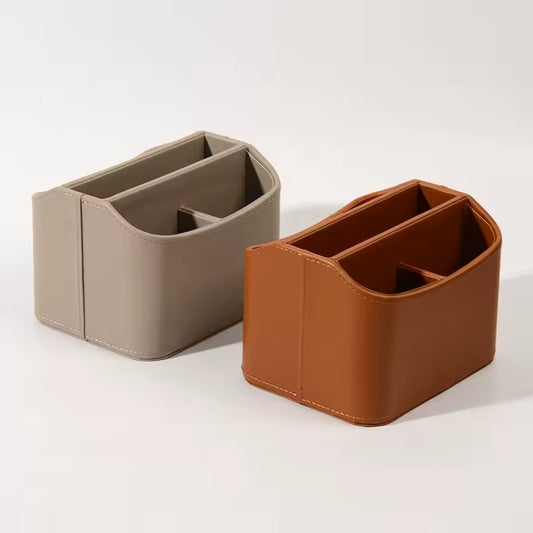 Leather Remote Control Organizer and Caddy with Tablet Slot Two leather desk organizers, one beige and one brown, on a white background.