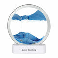 Lyell Sand Art LED | Aesthetic Moving Sand Picture Lamp blue variant GiftDealAU product image. Sand painting in a circular frame with blue and white colors on a white background