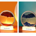 Lyell Sand Art LED | Aesthetic Moving Sand Picture Lamp GiftDealAU product image. Two sand painting lamps displaying mountain and ocean scenes on a colorful background.