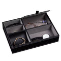 Mens Nightstand Organiser Tray
Black jewelry box with compartments containing jewelry items on a white background