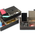 Mens Nightstand Organiser Tray
Two black leather jewelry and accessories organizers with items inside on a white background