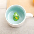 Peekaboo Animal Mug – Cute 3D Hidden Surprise Ceramic Coffee Cup
snake variant GiftDealAU product image. Green rubber duck in a light blue mug on a wooden surface