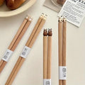 Plumpy Handmade Animal Chopsticks variants GiftDealAU product image. Wooden chopsticks with bear-shaped tips on a light surface