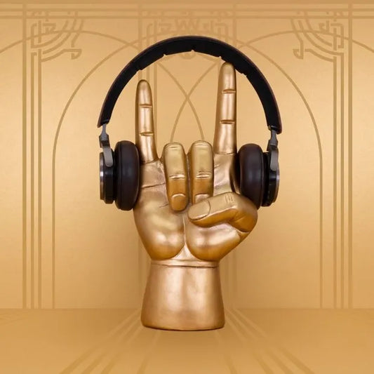 Rock On Statue Ring Holder Gold hand making a peace sign with headphones on a gold background