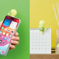 Smiski Hippers Blind Box styling GiftDealAU product image. Smartphone with a small yellow character on a green and yellow background
