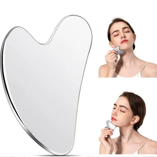 Stainless Steel Cool Gua Sha Woman using a heart-shaped mirror and skincare tool on a white background