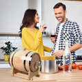 Wooden Whiskey Barrel GiftDealAU product image. Man and woman in a kitchen with a wooden barrel and wine glasses.